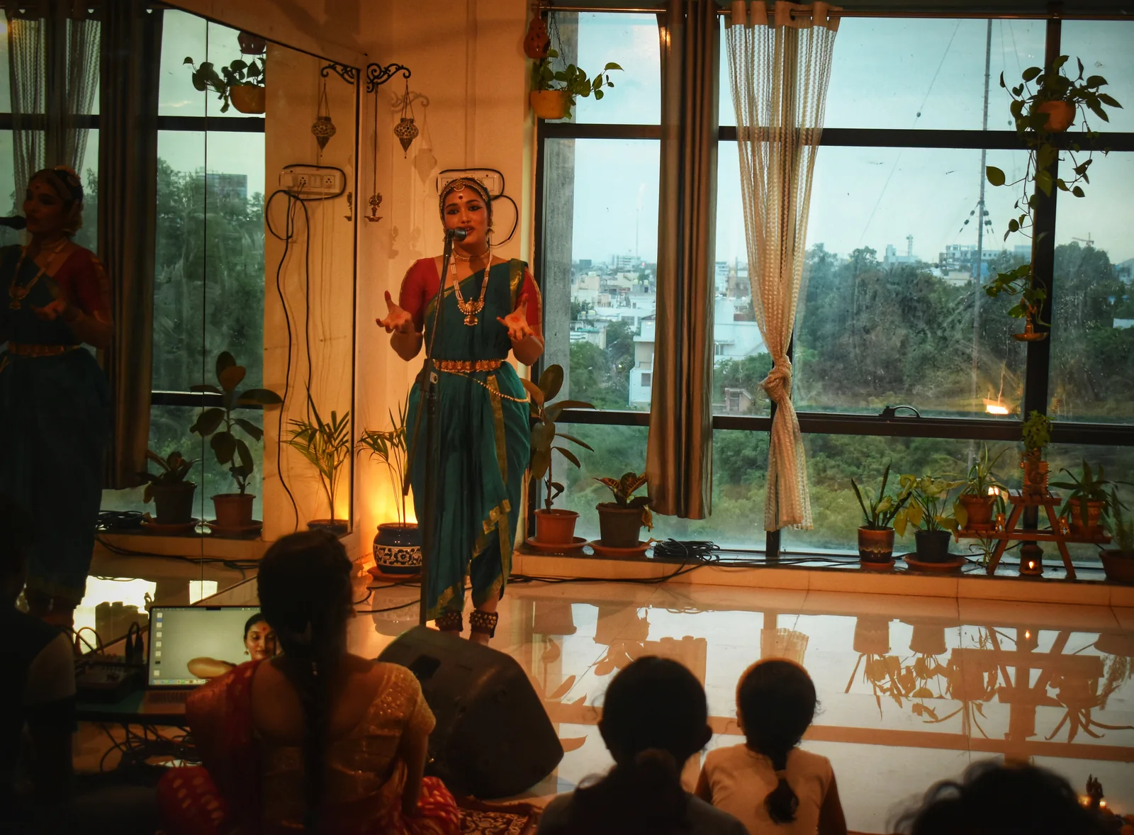 A storytelling performance in the studio with an audience
