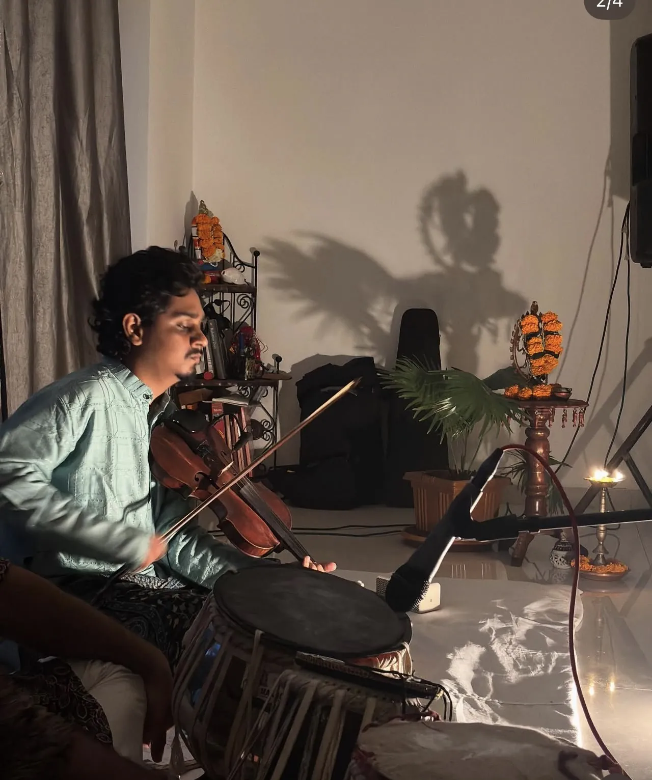 Violin and mridangam accompanying a recital